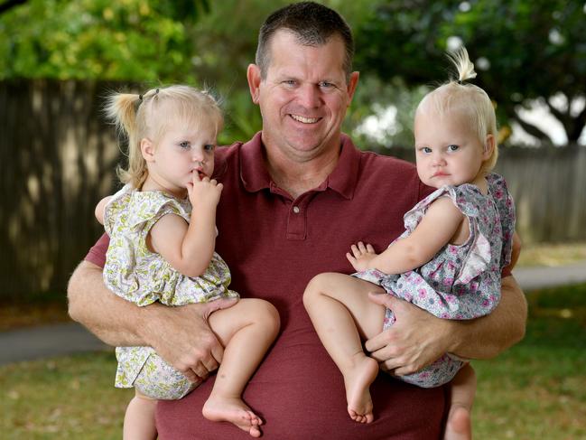 David Jamesion with twins Annabelle and Abigail. Picture: Evan Morgan