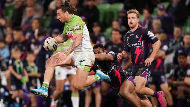 Canberra fullback Charnze Nicoll-Klokstad takes flight against the Storm. Picture: Scott Barbour/AAP