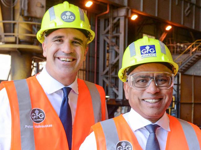 Premier Peter Malinauskas and Federal Minister Ed Husic talk to steel worker Matt Rogers after announcing the Whyalla steel plant will be run on hydrogen fuel, making it the first green steel plant in the world. April 4, 2023. Picture: GFG ALLIANCE/Brenton Edwards