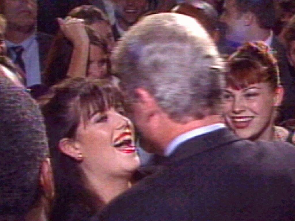 CNN footage of former White House intern Monica Lewinsky greeting US President Bill Clinton in 1996 at time of their alleged affair.