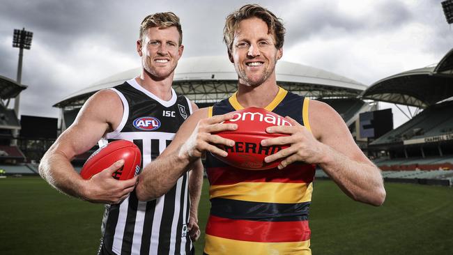 Port Adelaide captain Tom Jonas left, and Adelaide skipper Rory Sloane at Adelaide Oval. The Power and the Crows could play a Round 2 Showdown when the AFL restarts. Picture: Sarah Reed