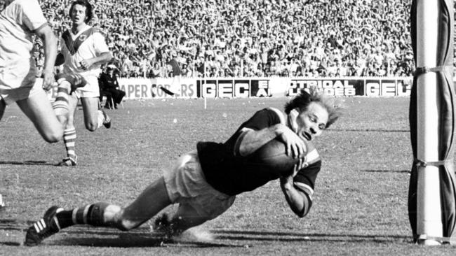 Johnny Mayes dives over to score a try during Easts premiership win in 1975 against St George.