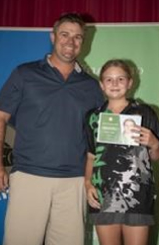 When she grows up, Emily would like to be a dolphin trainer. Photo taken with her dad.