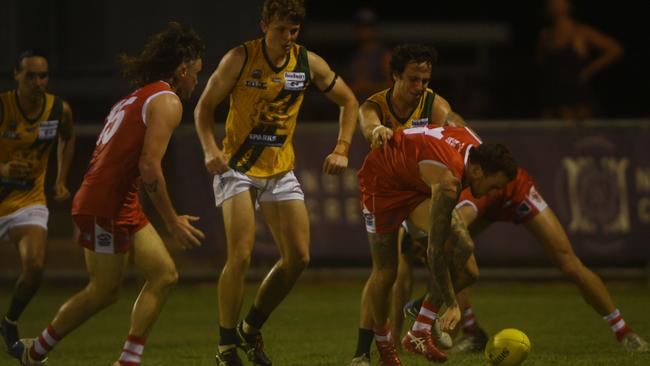 Waratah’s Jayden Magro scraps for the ball. Picture: (A)manda Parkinson