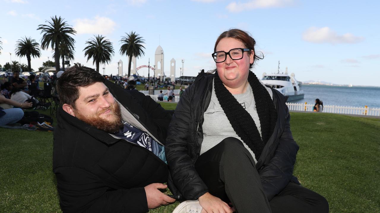 Zac Smith and Imogen Manderson. Locals and visitors arrived early to get a good spot for the Geelong New Years Eve celebrations. Picture: Alan Barber