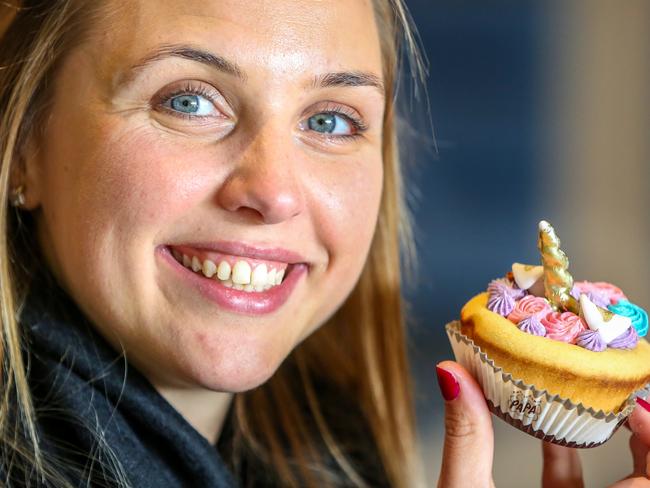 Hayley Fabricato taste tests a unicorn cake. Pictures: Angelo Velardo