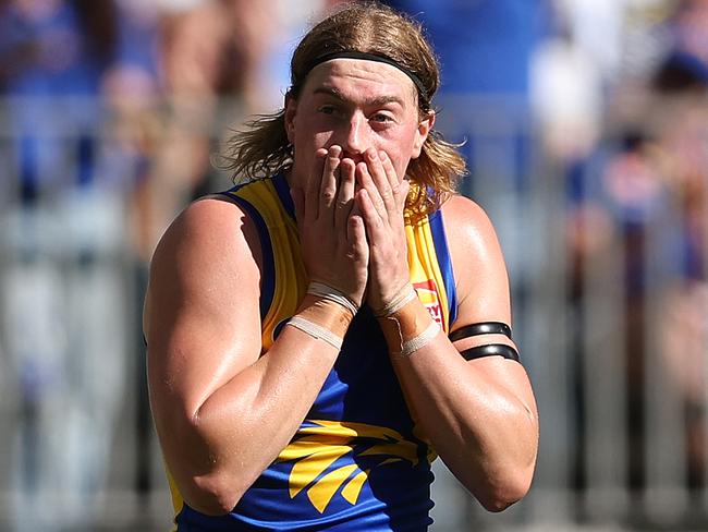 PERTH, AUSTRALIA - MARCH 16: Harley Reid of the Eagles reacts after celebrating a goal that was called a behind during the round one AFL match between West Coast Eagles and Gold Coast Suns at Perth Stadium, on March 16, 2025, in Perth, Australia. (Photo by Paul Kane/Getty Images)