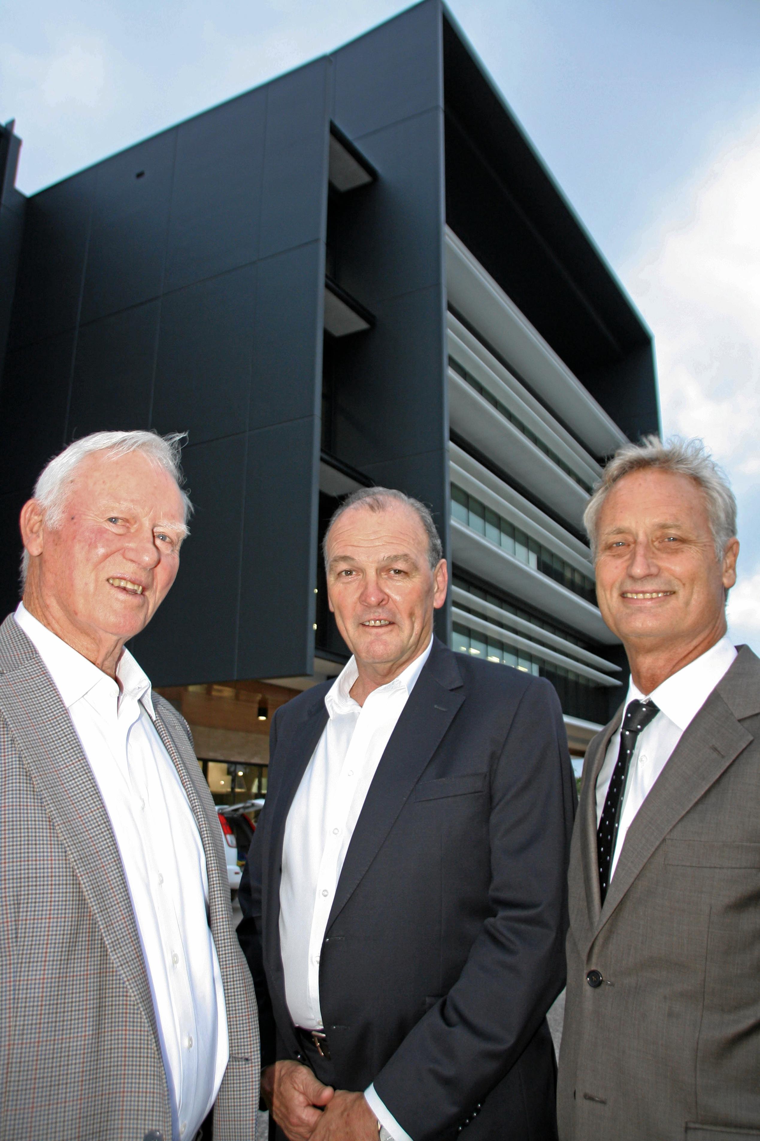 ?Jack Hutchinson, Greg Quinn and Scott Hutchinson of Hutchinson Builders at the new Youi headquarters, Sippy Downs. Picture: Erle Levey