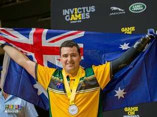 LOCAL HERO: Lismore's Australian Invictus Games team member, Pilot Officer Nathan Parker has won a gold and silver medal for indoor rowing and a silver in athletics at the 2018 event. Picture: CPL Jake Sims