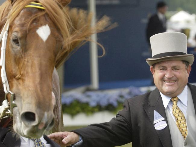 JUNE 21, 2003: Trainer & part owner Paul Perry with trophy with racehorse Choisir, ridden by jockey Johnny Murtagh, after winning The Golden Jubilee Stakes at Royal Ascot near London in England, 21/06/03.Turf P/