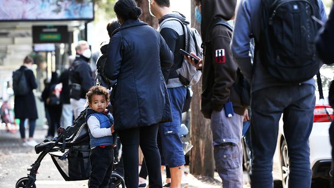 People queue outside the Darlinghurst Centrelink office in inner-east Sydney in July. Picture: Jane Dempster