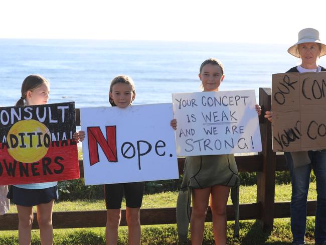Members of the public took part in a paddle-out at Byron Bay's Main Beach to protest against the planned Netflix reality show Byron Baes on the morning of Tuesday, April 20, 2021. Picture: Liana Boss