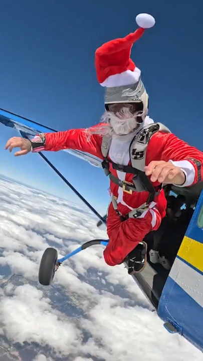 Santa Claus skydives into Geelong region in time for Christmas