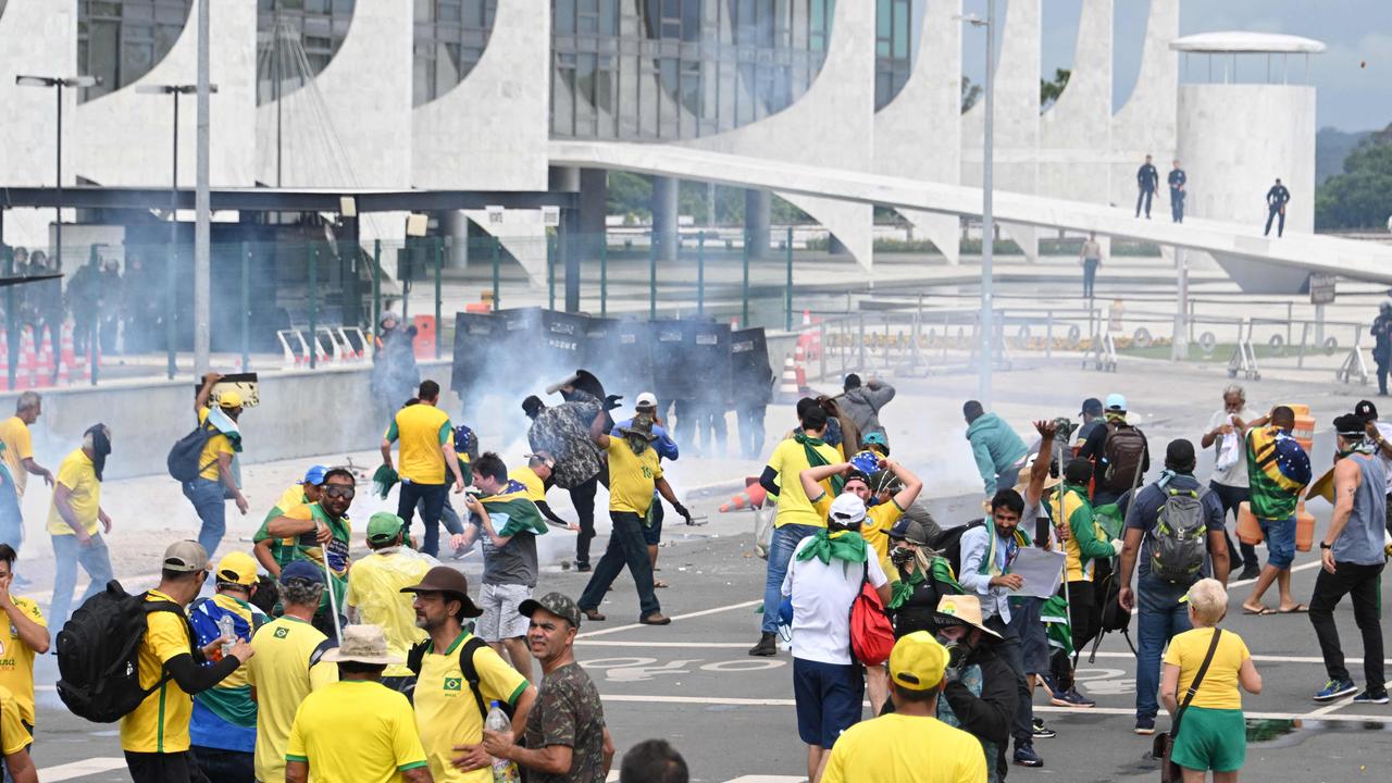 Supporters of Bolsonaro clash with the police. Picture: EVARISTO SA/AFP