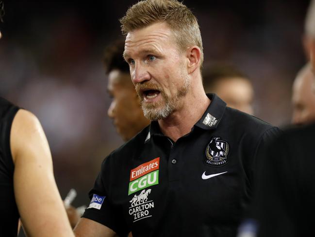 MELBOURNE, AUSTRALIA - APRIL 01: Nathan Buckley, Senior Coach of the Magpies addresses his players during the 2021 AFL Round 03 match between the Collingwood Magpies and the Brisbane Lions at Marvel Stadium on April 01, 2021 in Melbourne, Australia. (Photo by Michael Willson/AFL Photos via Getty Images)