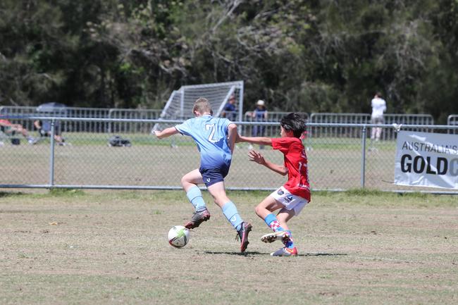 The Premier Invitational football tournament on the Gold Coast. Gold Coast Knights Red v Springfield United under-13s in action. Picture: Mike Batterham.