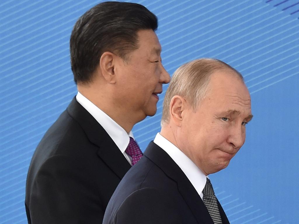Russia's President Vladimir Putin and China's President Xi Jinping (Photo by Vyacheslav OSELEDKO / AFP)