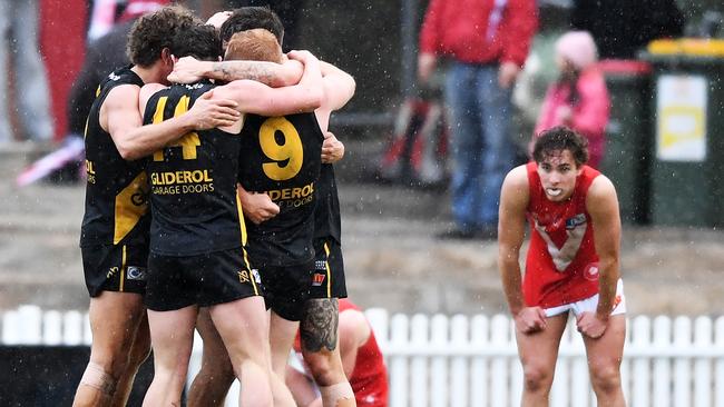 Glenelg celebrates a three-point win over North Adelaide. Picture: Mark Brake/AAP