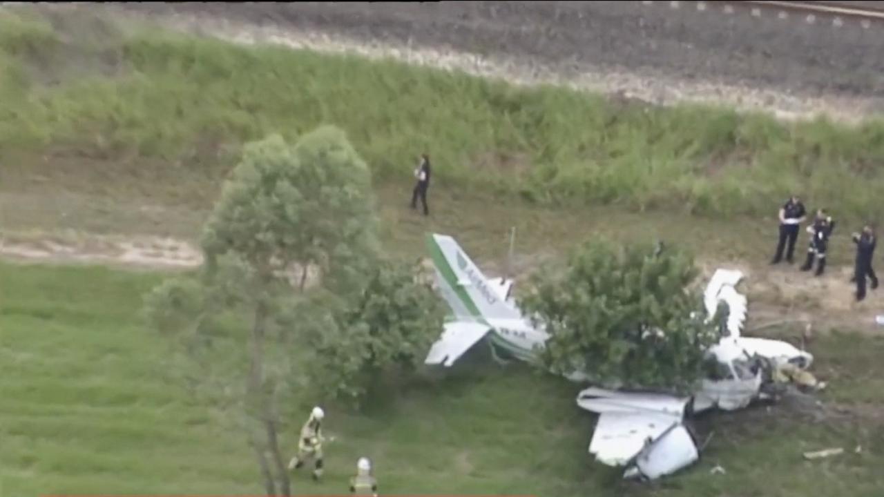 The female pilot was taken to hospital with minor injuries. Picture: Queensland Ambulance Service.