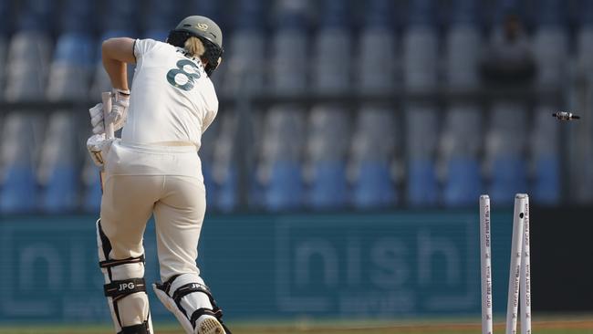 MUMBAI, INDIA - DECEMBER 21: Ellyse Perry of Australia is bowled out by Pooja Vastrakar of India during day one of the Women's Test Match between India and Australia at Wankhede Stadium on December 21, 2023 in Mumbai, India. (Photo by Pankaj Nangia/Getty Images)