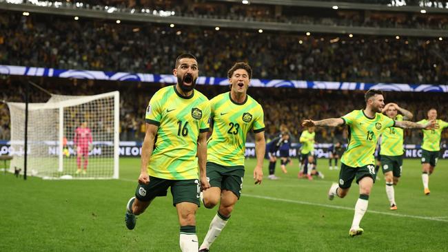 Aziz Behich celebrates the massive goal for Australia against Japan. (Photo by Robert Cianflone/Getty Images)