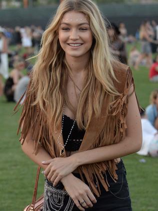 Gigi is mad for fringing and pointless vests.