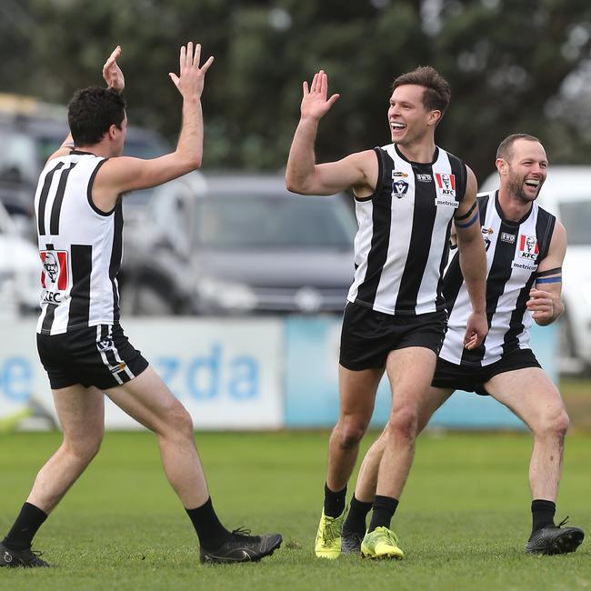 Sale’s Shannen Lange, centre, won his second Trood Award and Rodda Medal in the Gippsland league. Picture: Yuri Kouzmin