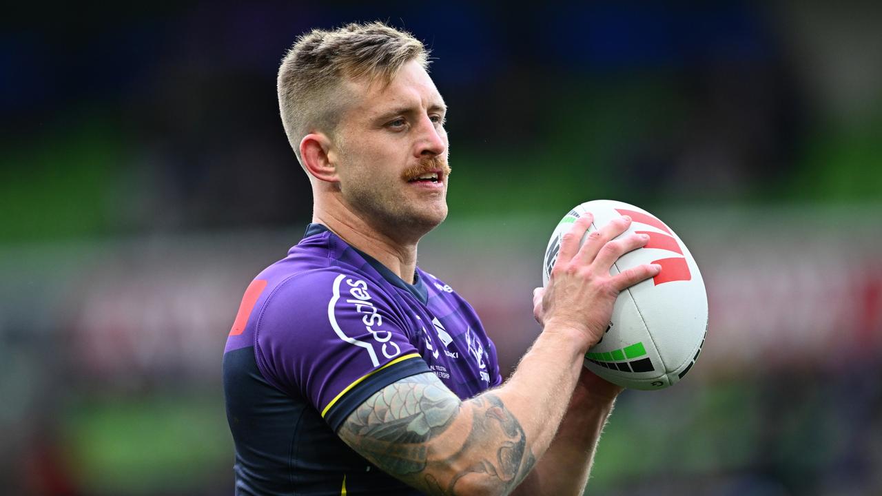 MELBOURNE, AUSTRALIA - SEPTEMBER 14: Cameron Munster of the Storm warms up before the NRL Qualifying Final match between Melbourne Storm and Cronulla Sharks at AAMI Park on September 14, 2024 in Melbourne, Australia. (Photo by Quinn Rooney/Getty Images)