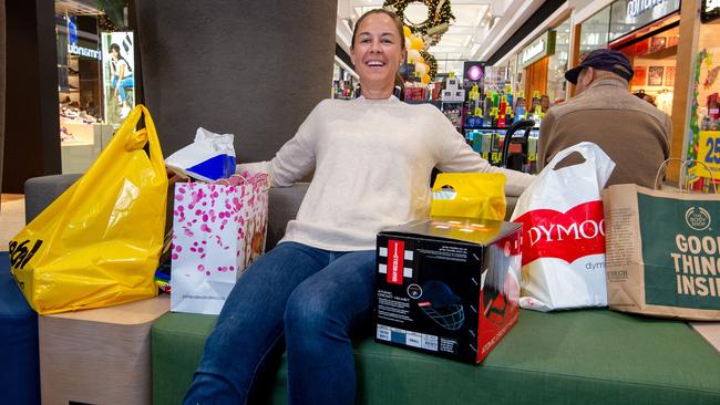 Sam Crawford from Clarkefield at Watergardens Shopping Centre with her huge swag of Christmas presents. Picture: Jay Town