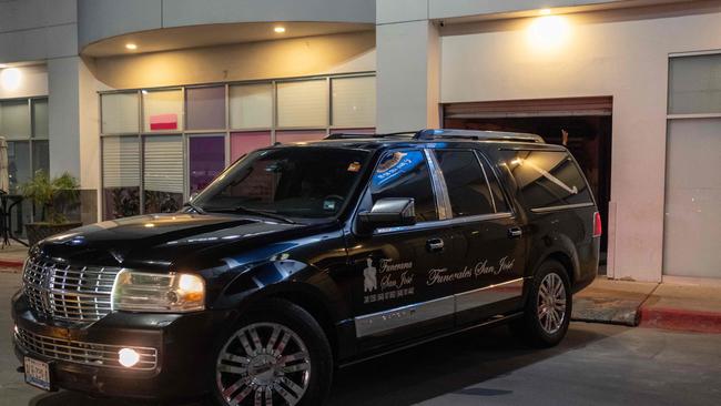 The vehicle left a funeral home in the border city of Tijuana with the bodies of brothers Jake and Callum Robinson en route to a border crossing. Picture: AFP