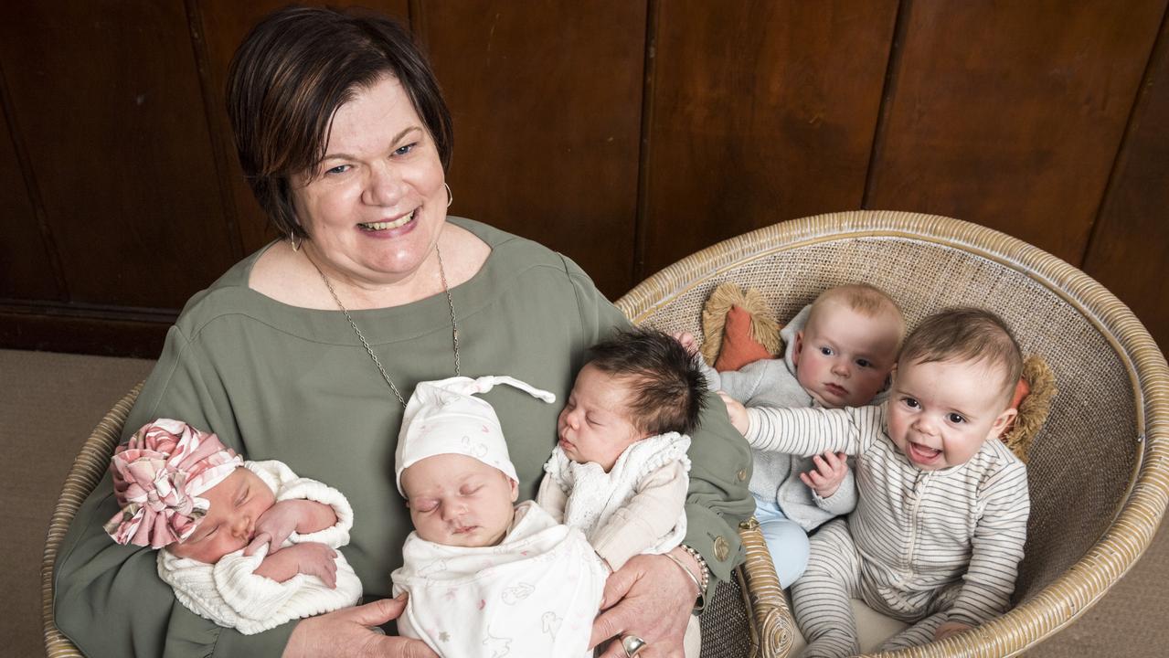 My Midwives director Liz Wilkes with babies she has delivered (from left) Poppy Carter, Lucy Paul, Adalynn Thomas, Dawson Rogers and William Hagan. Picture: Kevin Farmer