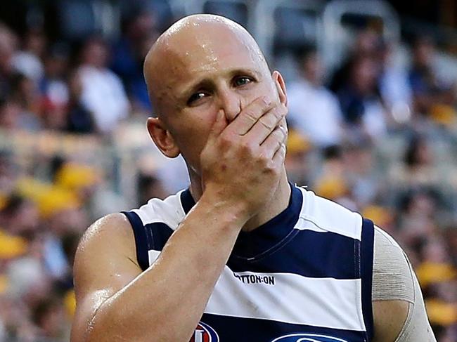 PERTH, AUSTRALIA - APRIL 8: Gary Ablett of the Cats leaves the field with a possible hamstring injury during the 2018 AFL round 03 match between the West Coast Eagles and the Geelong Cats at Perth Stadium on April 8, 2018 in Perth, Australia. (Photo by Will RussellAFL Media)