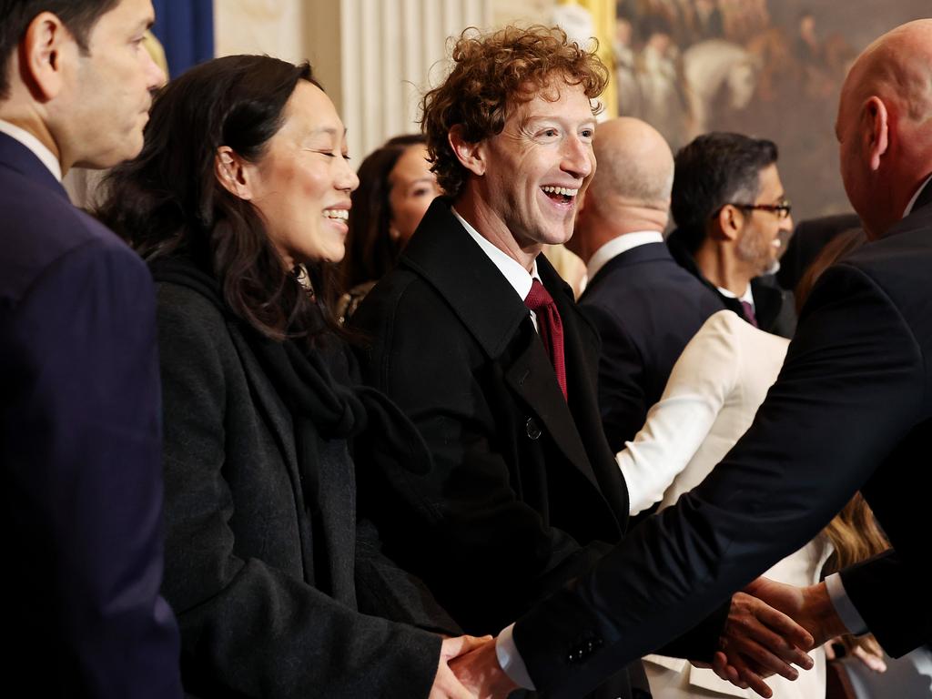 We’re here, that’s a fact ... Meta and Facebook CEO Mark Zuckerberg and his wife Priscilla Chan arrive at the inauguration of Donald Trump on Monday.