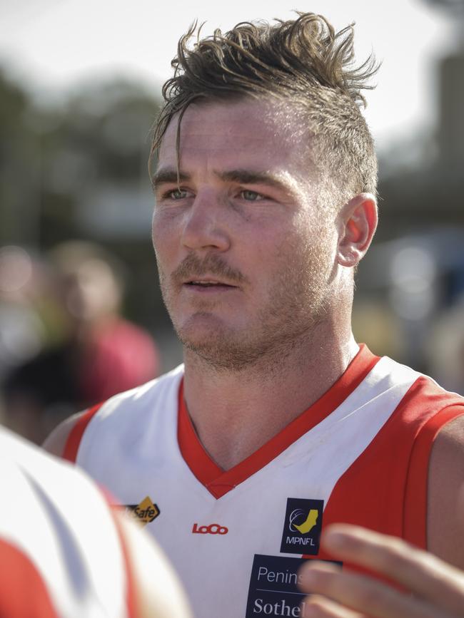 Sorrento coach Luke Tapscott addresses his players at three quarter-time.