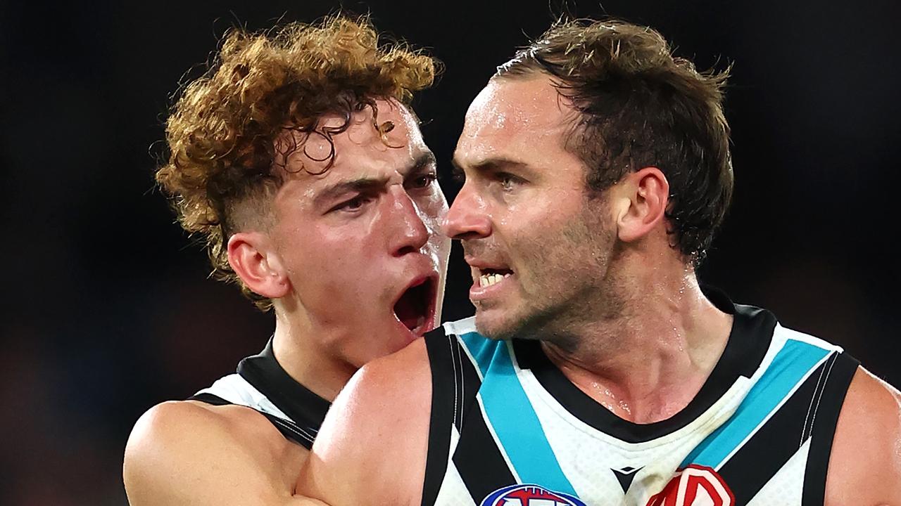 MELBOURNE, AUSTRALIA - JUNE 30: Jeremy Finlayson of the Power is congratulated by Logan Evans after kicking a goal during the round 16 AFL match between St Kilda Saints and Port Adelaide Power at Marvel Stadium, on June 30, 2024, in Melbourne, Australia. (Photo by Quinn Rooney/Getty Images)