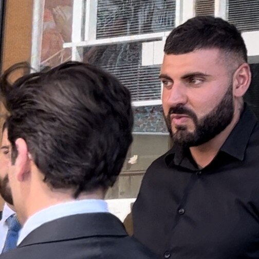 Lucas Azzopardi outside Downing Centre with lawyer Matthew Laba.
