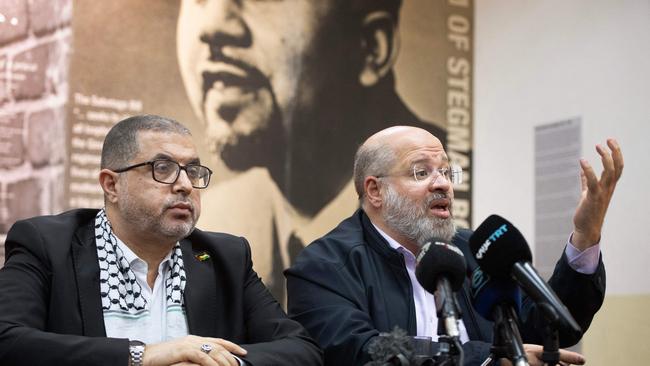 Hamas leaders Basem Naim, a former Gaza health minister, and Khaled Qaddoumi during a press conference in Cape Town on November 29.