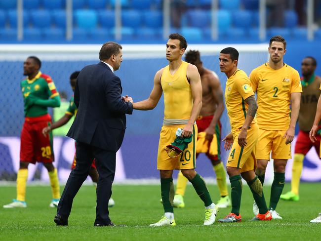 Ange Postecoglou manager of Australia shakes hands with Trent Sainsbury.