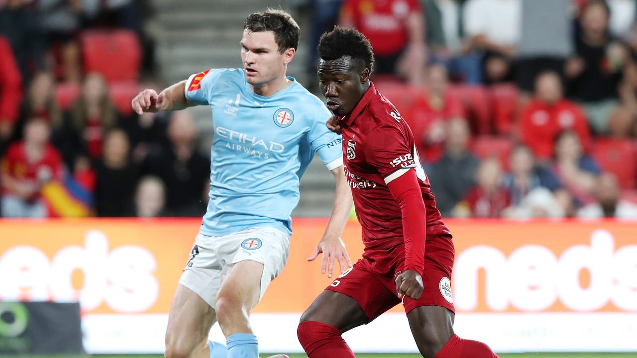 Nestory Irankunda (right) has been tipped to shine for Adelaide United this season. Picture: Sarah Reed/Getty Images
