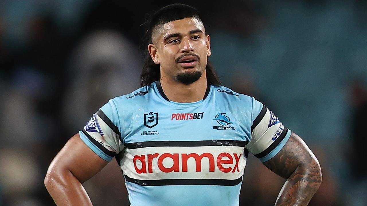 SYDNEY, AUSTRALIA - SEPTEMBER 28: Oregon Kaufusi of the Sharks reacts after losing the NRL Preliminary Final match between the Penrith Panthers and the Cronulla Sharks at Accor Stadium on September 28, 2024 in Sydney, Australia. (Photo by Jason McCawley/Getty Images)