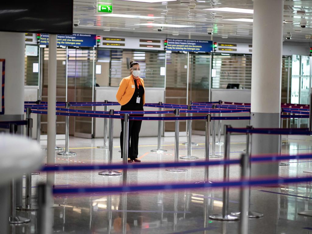 Checking in at airports these days can be an eerily quiet experience. Picture: AFP