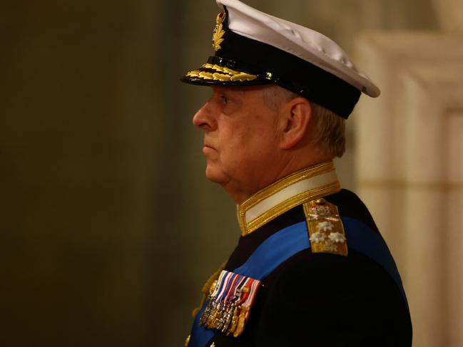 LONDON, ENGLAND - SEPTEMBER 16: Prince Andrew, Duke of York attends a vigil, following the death of Queen Elizabeth ll, inside Westminster Hall on September 16, 2022 in London, England. Queen Elizabeth II's children mount a family vigil over her coffin lying in state in Westminster Hall. Queen Elizabeth II died at Balmoral Castle in Scotland on September 8, 2022, and is succeeded by her eldest son, King Charles III. (Photo by Hannah Mckay - WPA Pool / Getty Images)