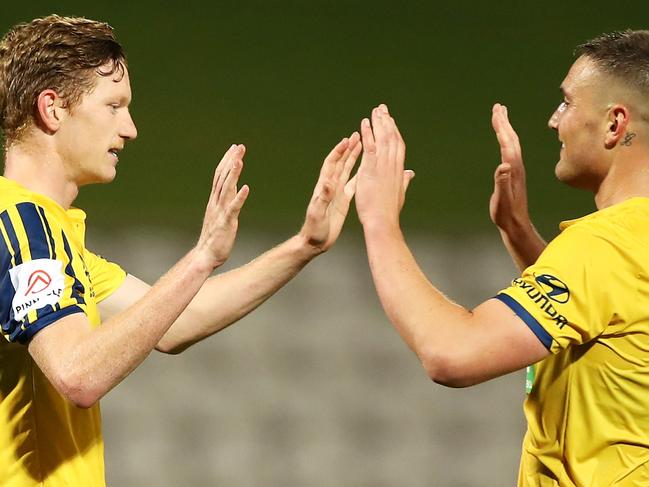 SYDNEY, AUSTRALIA - AUGUST 03: Kye Rowles and Dylan Fox of the Mariners celebrate victory during the round 26 A-League match between the Melbourne Victory v Central Coast Mariners at Netstrata Jubilee Stadium on August 03, 2020 in Sydney, Australia. (Photo by Mark Kolbe/Getty Images)