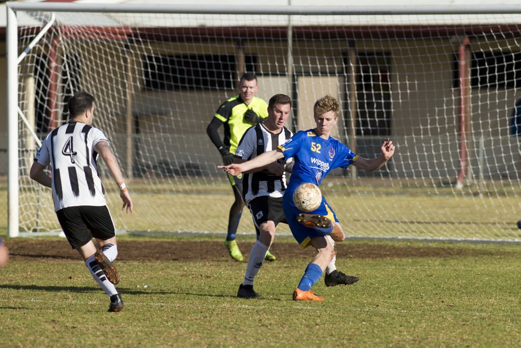 Rhett Greenslade (left) of Willowburn defends against Cormac McCarthy of USQ FC in Toowoomba Football League Premier Men semi-final at Commonwealth Oval, Sunday, August 26, 2018. Picture: Kevin Farmer