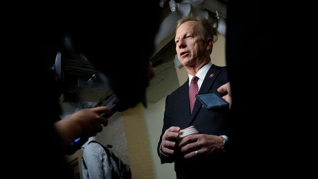 Rep. Kevin Hern talks to reporters before attending a Republican caucus meeting in the basement of the U.S. Capitol following the formal impeachment inquiry. Picture: AFP