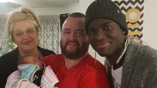 Isaac Ntiamoah (right) with wife Angelina and their son Josiah being cradled by close friend David Yarza Porto. Picture: Instagram