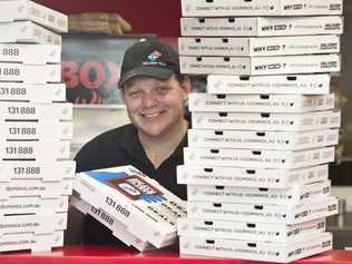 Myles Copson of Westridge Dominos Pizza is excited the store sold the most pizzas of any store on the night of the first State of Origin game, Friday, June 22, 2018. Picture: Kevin Farmer