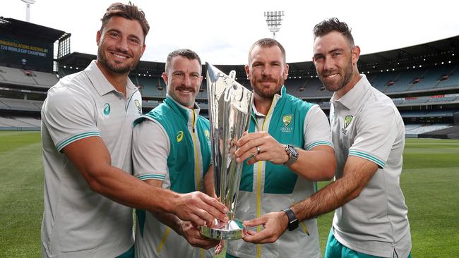 Marcus Stoinis, Matthew Wade, captain Aaron Finch and Glenn Maxwell with the World Cup trophy. Picture: Michael Klein