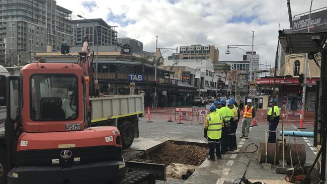 Repair works under way at the corner of Morphett and Hindley Sts.