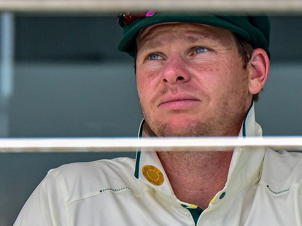 Australia's captain Steve Smith looks on from the pavilion as rain halts play during the third day. Picture: Ishara S. KODIKARA / AFP